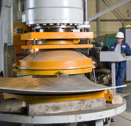 Press forming plate for a storage tank Press forming plate for a storage tank